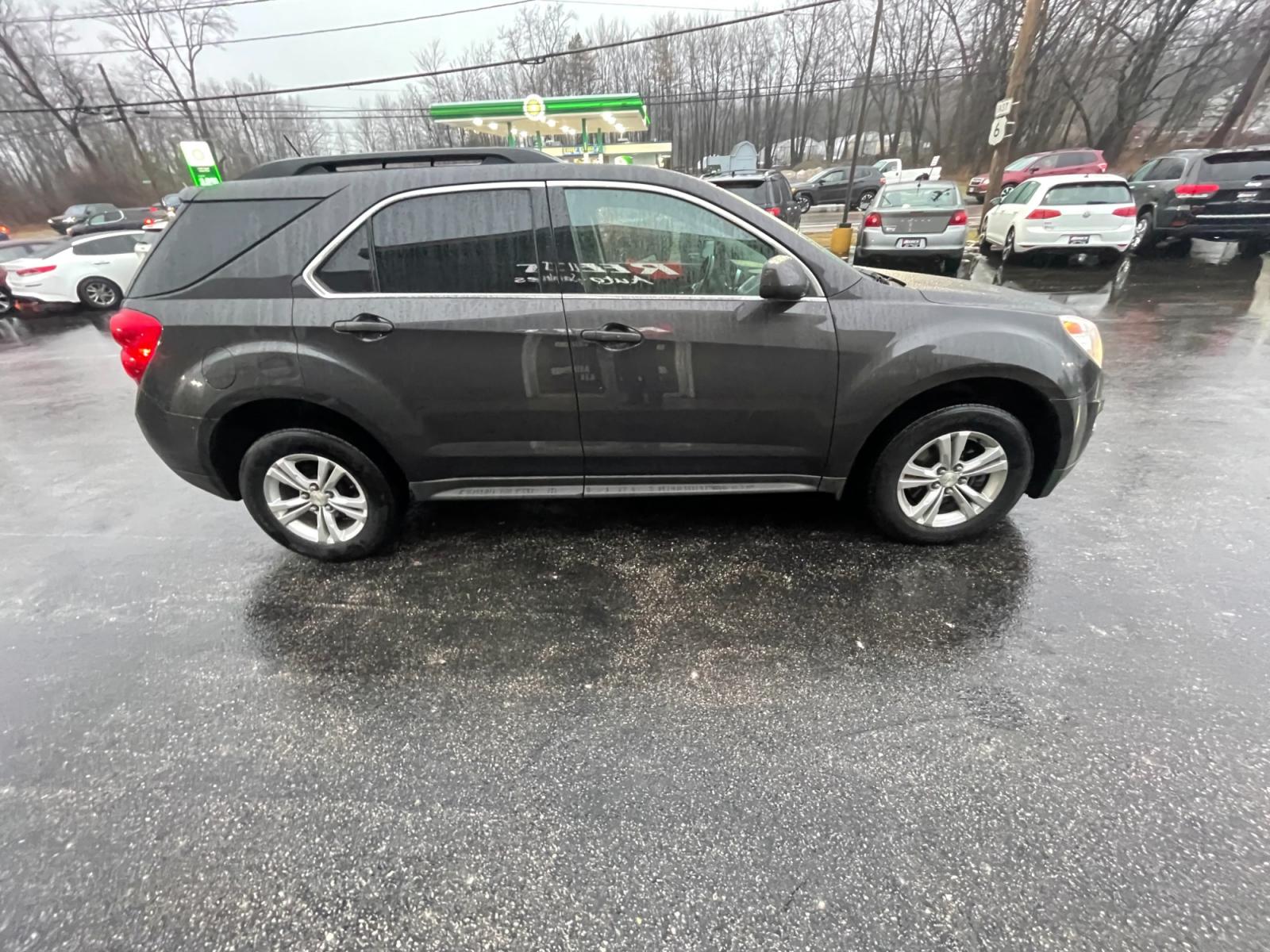 2014 Gray /Black Chevrolet Equinox 2LT AWD (2GNFLGEK8E6) with an 2.4L I4 DOHC 16V engine, 6-Speed Automatic transmission, located at 11115 Chardon Rd. , Chardon, OH, 44024, (440) 214-9705, 41.580246, -81.241943 - This 2014 Chevrolet Equinox 2LT AWD with the 2.4L ECOTEC engine and a 6-speed automatic transmission is a well-equipped mid-size crossover SUV. It offers a comfortable driving experience with premium features including heated seats, automatic climate control, and a Pioneer sound system for an enhanc - Photo #5